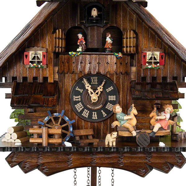 Chalet-style Black Forest battery-powered musical cuckoo clock with moving dancers, watermill-wheel, and see-saw 34 cm by Engstler
