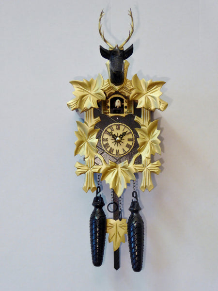 Carved battery-powered cuckoo clock with deer head and five maples leaves (Black & gold) 30 cm by Engstler