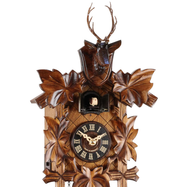 Carved 8-day cuckoo clock with deer head and carved leaves 28 cm by Engstler