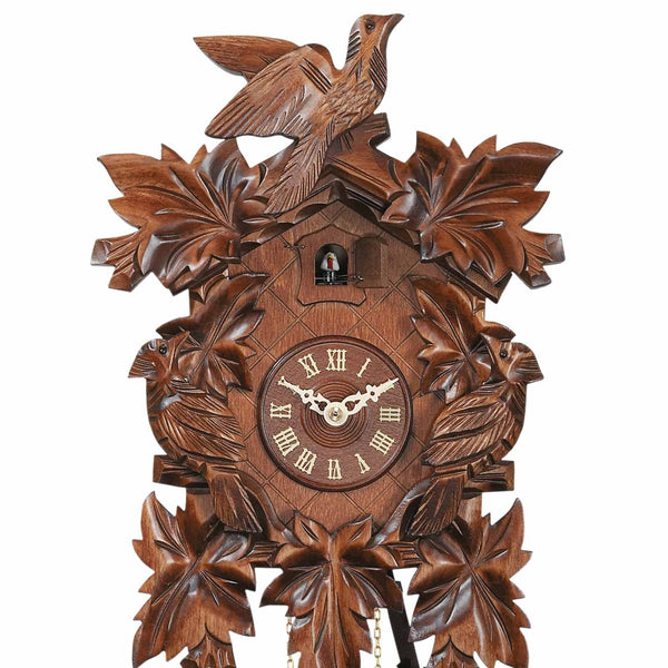 Carved battery-powered cuckoo clock with large cuckoo bird, two smaller birds, five leaves, with music 35 cm by Engstler