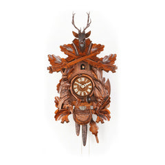  Cuckoo Clock - Carved 1-day hunting-style cuckoo clock with stag head, hanging hare and pheasant, rifles, fürst pless horn, and game bag 40cm by Hekas - Cuckoo Collections
