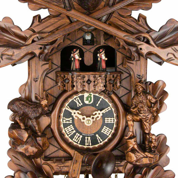  Cuckoo Clock - Carved 8-day hunting style musical cuckoo clock stag head, ibex, hunter, rifles, pless-horn, and dancers 61cm by Hönes - Cuckoo Collections