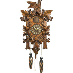 Carved battery-powered musical cuckoo clock with bird and five leaves 35 cm by Trenkle Uhren