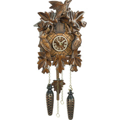 Carved battery-powered musical cuckoo clock with birds and leaves 24 cm by Trenkle Uhren