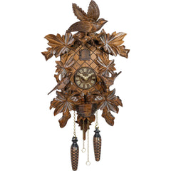 Carved battery-powered musical cuckoo clock with birds and leaves 46 cm by Trenkle Uhren