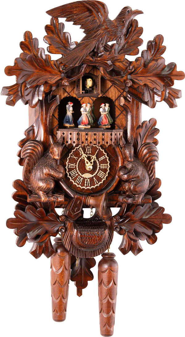 Carved batterypowered musical cuckoo clock with dancers, bird and squ