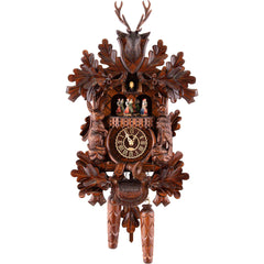Carved hunting-style battery-powered musical cuckoo clock with stag head and dancers 42 cm by Trenkle Uhren