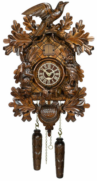 Carved style quartz cuckoo clock with bird in flight & hunter theme 42 cm by Trenkle Uhren