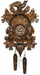 Carved style quartz cuckoo clock with bird in flight & hunter theme 42 cm by Trenkle Uhren