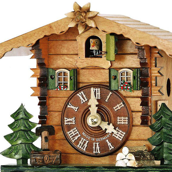  Cuckoo Clock - Chalet 1-day cuckoo clock as a decorated cabin with a carved Edelweiss flower 19cm by Hubert Herr - Cuckoo Collections