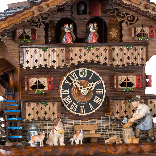 Cuckoo Clock - Chalet 8-day musical cuckoo clock with St Bernard and her puppies, a moving wood-chopper, belfry bell-tower, mill-wheel, and dancers 34cm by Hönes - Cuckoo Collections