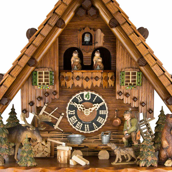   - Chalet 8-day musical 'Hunters house' cuckoo clock with hunter, bear, moose, dog, and moving dancers 44cm by Hönes - Cuckoo Collections