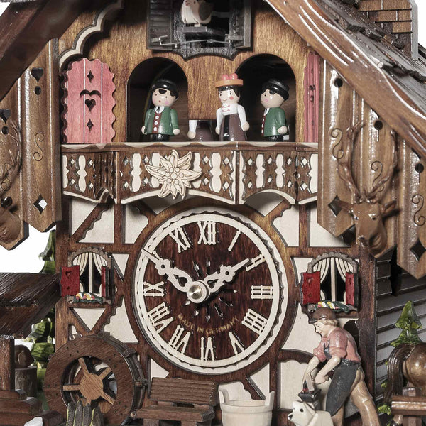Chalet-style Black Forest battery-powered musical cuckoo clock with moving dancers, watermill-wheel, and blacksmith 35 cm by Engstler